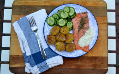 Norwegian Roasted Salmon with Hasselback Potatoes, Quick Pickle Cucumbers and Dill Sour Cream Sauce